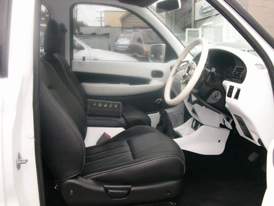 City-Trim-Speciality car works Seats-roof linings-carpeting-tonneau-covers-van-seats-white